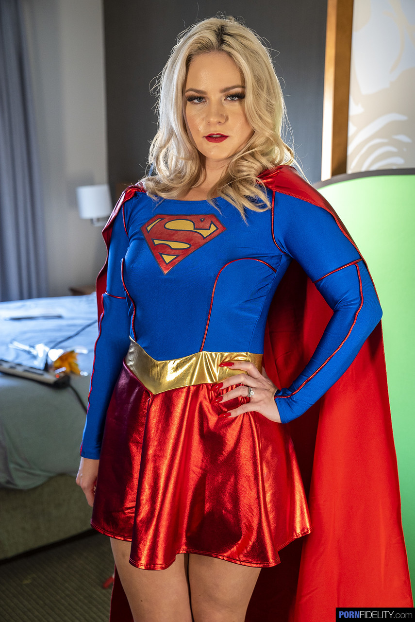 Blonde supergirl Lisey Sweet exposes her yummy ass and hot tits in a solo