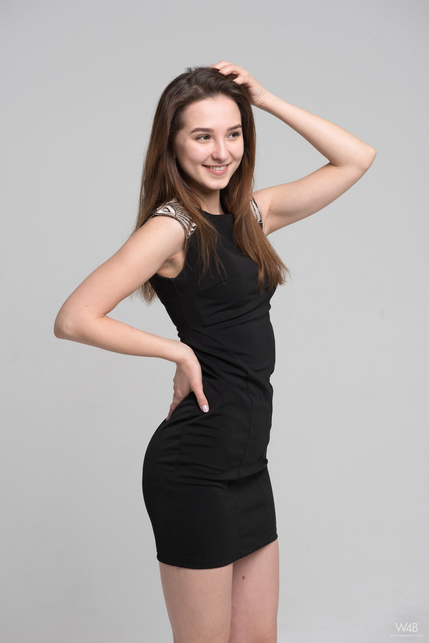 European sweetie Milana removes her black dress to show her amazing figure