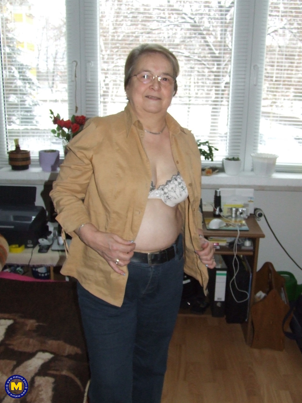 Fat European granny Sybille stripping off her clothes and skin tone tights