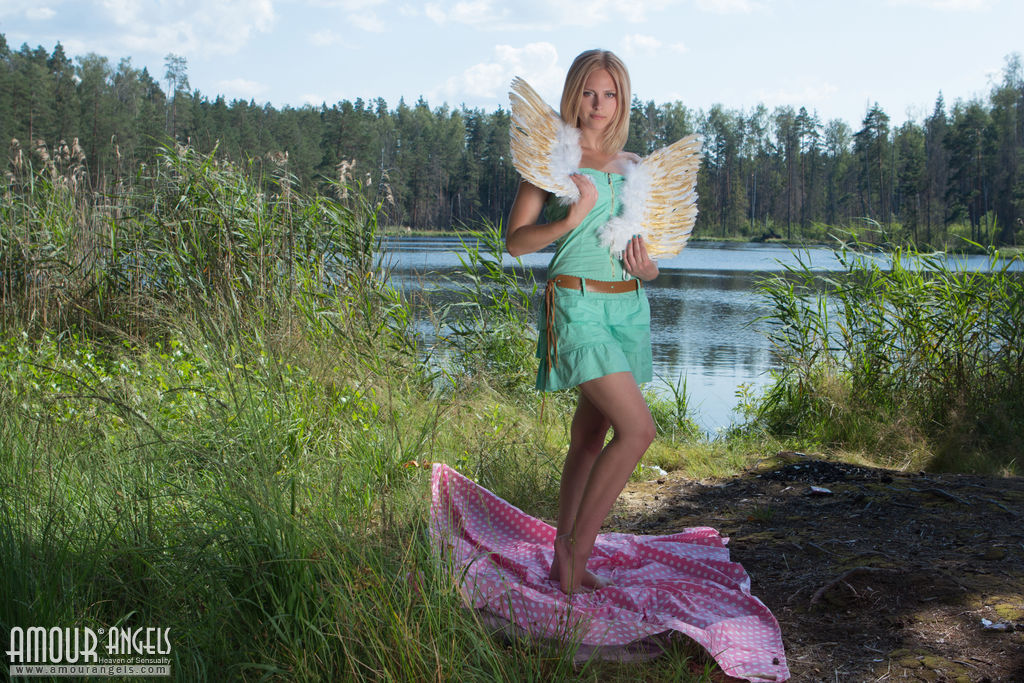 This Flawless Blonde Teen Starts Flapping Her Wings On The Lap Of Nature While She Is Sho